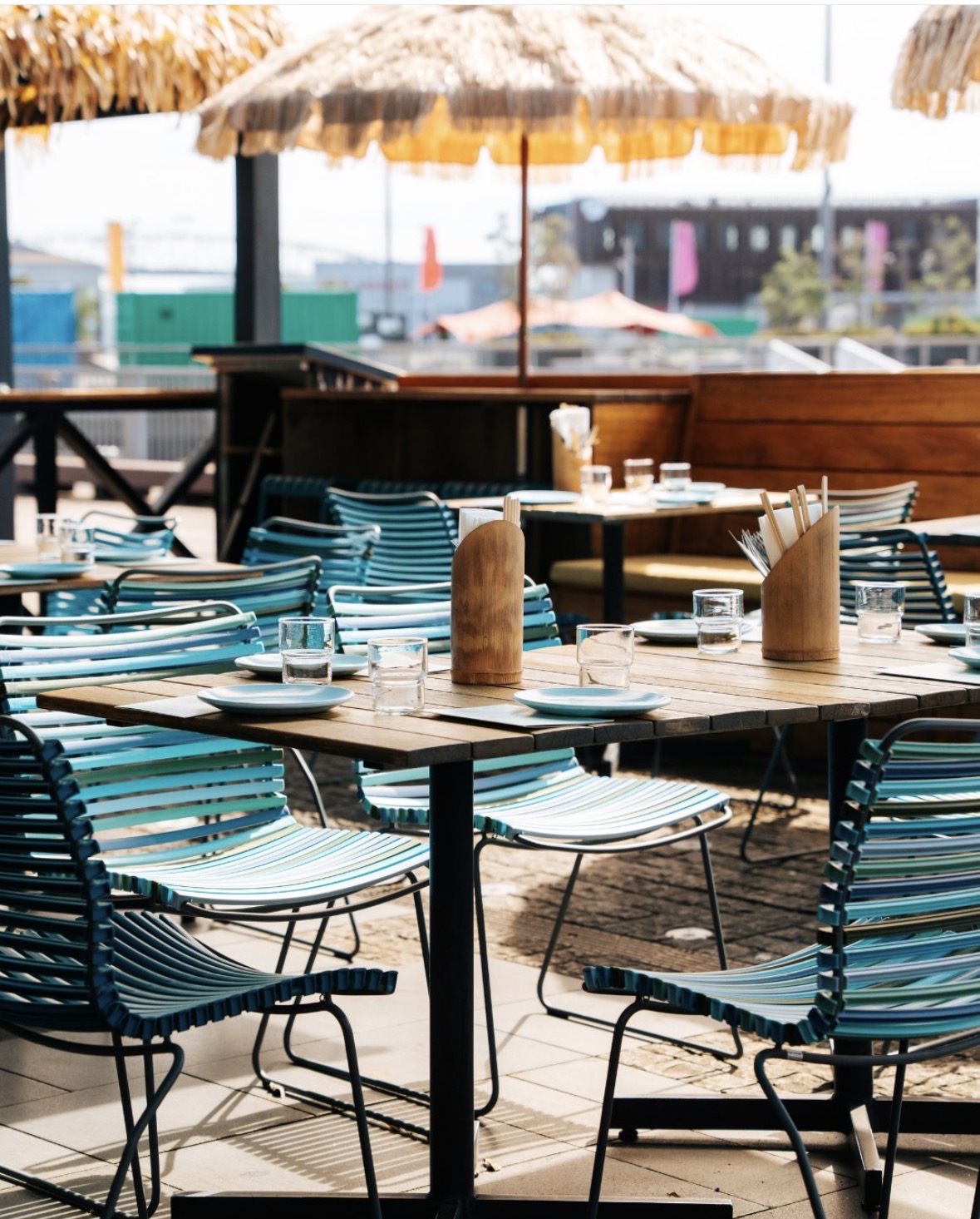Turquoise outdoor chairs on The Kokoscape deck