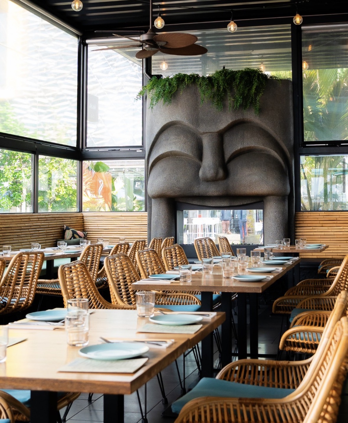 The Kokoscape dining room with its sculptural Tiki fireplace